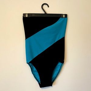 Vintage, strapless, one piece bathing suit. Lightly worn.